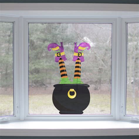 Create a spooky atmosphere with witch window glass stickers